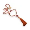 Long star necklace in brick color