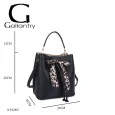 Rigid black handbag with leopard print bow