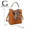 Elegant camel-colored rigid handbag with leopard print bow