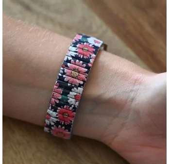 Ernest has a coral big daisy pattern watch