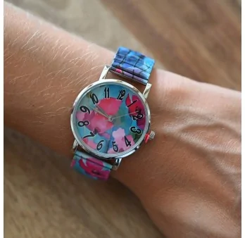 Ernest\'s watch with a fuchsia and turquoise floral pattern