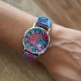 Ernest's watch with a fuchsia and turquoise floral pattern