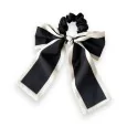 Fancy elastic hair scrunchie with black and white bow