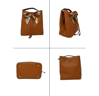 Camel rigid handbag from Gallantry with chic scarf bow