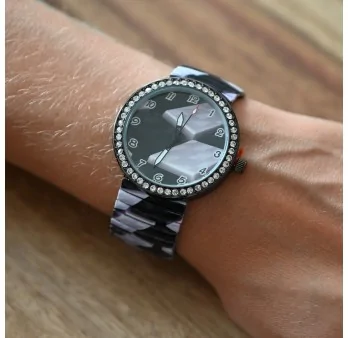 Ernest\'s watch with black and white pattern
