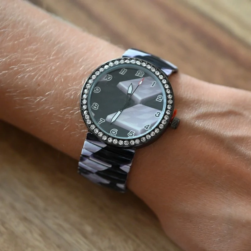 Ernest's watch with black and white pattern