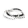 Set of 3 Ikita elastic fashion bracelets in Black and White