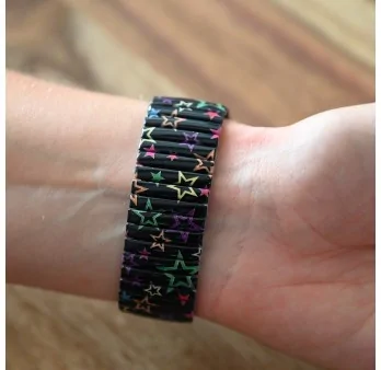 Ernest's black watch with multicolored stars