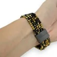 Multi-strand bracelet with gold and black beads