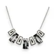 Fashion necklace by Ikita with Black and White geometric pendants