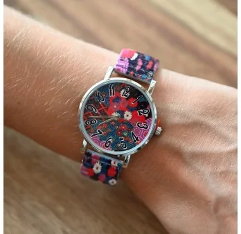 Ernest\'s watch features multicolored floral patterns