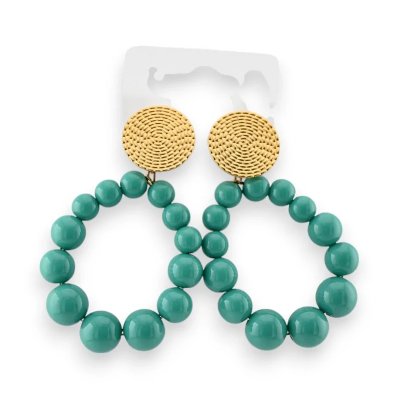 Steel hoop earrings with green pearls