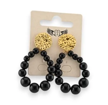 Boucles d'oreilles pendantes perles noires et médaillon doré