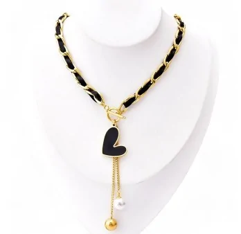 Asymmetric Gold and Black Heart Necklace