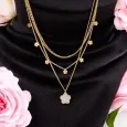 Collier multichaînes floral en acier doré