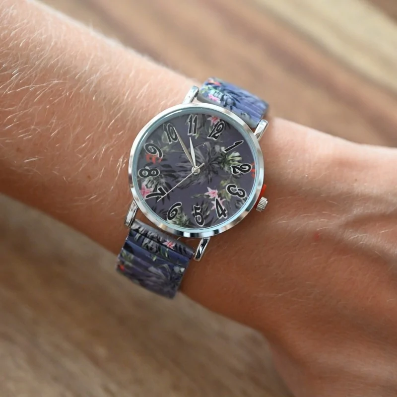 Ernest's watch featuring a tropical foliage pattern