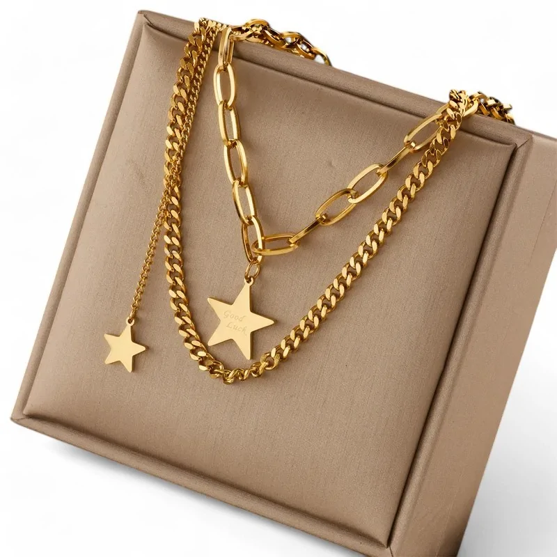 Double chain necklace in gold-plated steel with lucky star charm