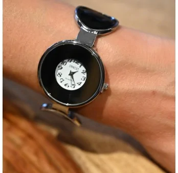 Ernest\'s black polka dot bracelet watch with a grey mirror dial