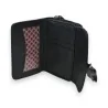 Portefeuille compact noir brillant Mélanie Paris ouvert avec compartiments et doublure...