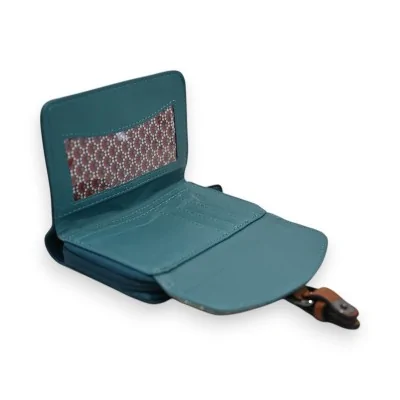 Portefeuille compact bleu pétrole ouvert avec motif intérieur et languette dorée Portefeuille compact bleu pétrole ouvert avec motif intérieur et languette dorée